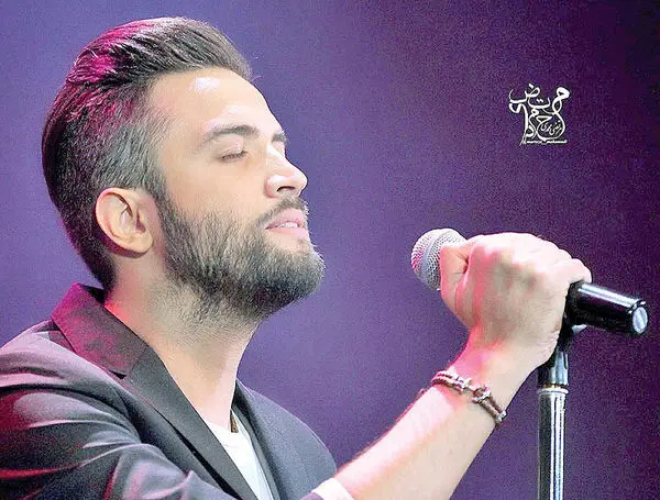 بنیامین بهادری و همسر و پسرش در حرم امام رضا+عکس
