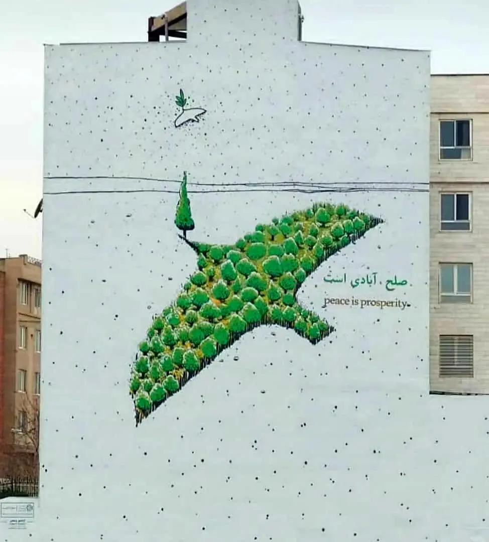 تصویر "صلح ،آبادی است" بر دیواره بزرگراه جلال آل احمد نقش بست