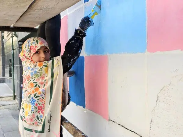 ایران، ای سرای امید؛ نقشی از صلح و پایداری بر دیوارهای زخم‌خورده کوی نصر

