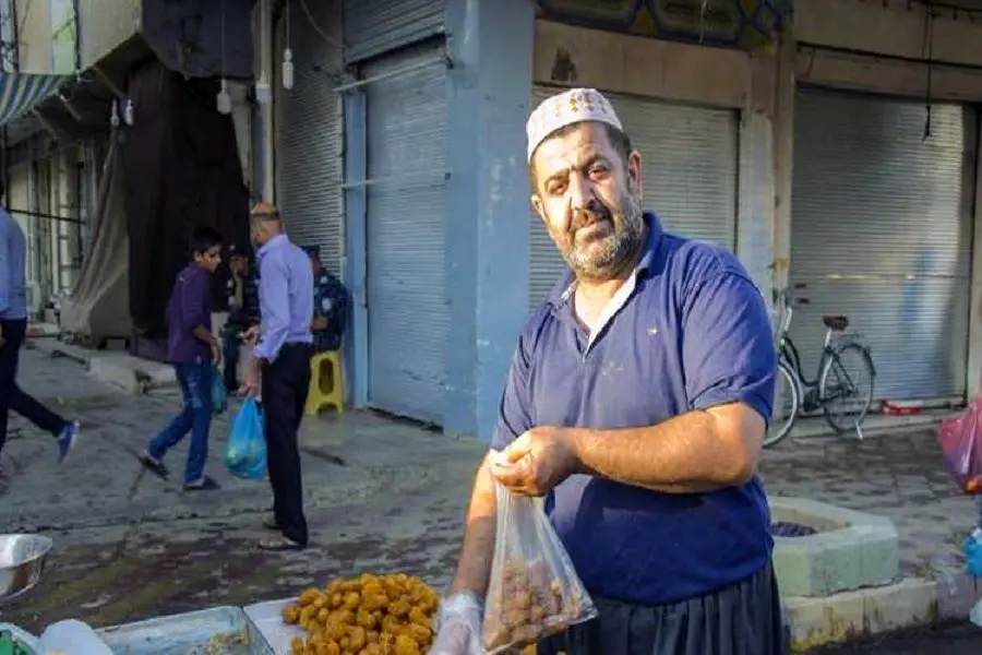دست فروشی که نماینده پارلمان شد+عکس