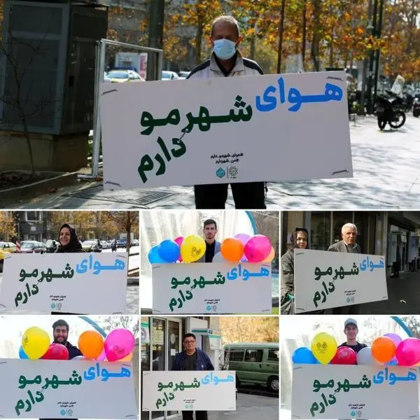 عکس یادگاری شهروندان با شعار طرح «من شهردارم»
