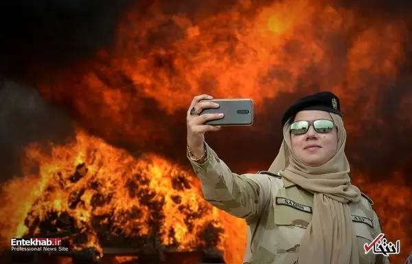 سلفی پلیس با محموله منهدم شده+عکس