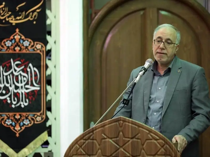 فضای بانک مسکن با پرچم متبرک حرم اباعبدا...(ع) عطرآگین شد

