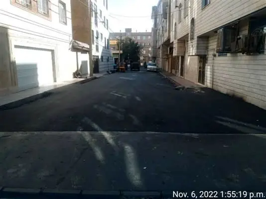 تداوم پخش آسفالت و بهسازی معابر منطقه 19در طرح خدمت