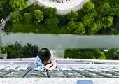 پرش کودک با چتر از بالکن طبقه پنجم! +عکس