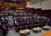 اهتزاز پنج حلقه المپیک در جوار بارگاه ملکوتی امام رضا