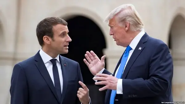 اثر دست دادن محکم ماکرون با ترامپ+عکس
