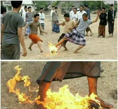 فوتبال بازی کردن با آتش+عکس