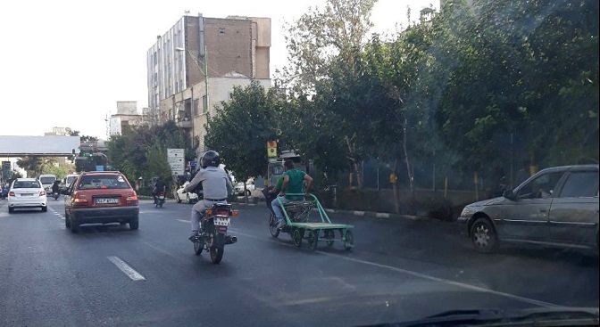حمل گاری با موتورسیکلت در خیابان های تهران+عکس